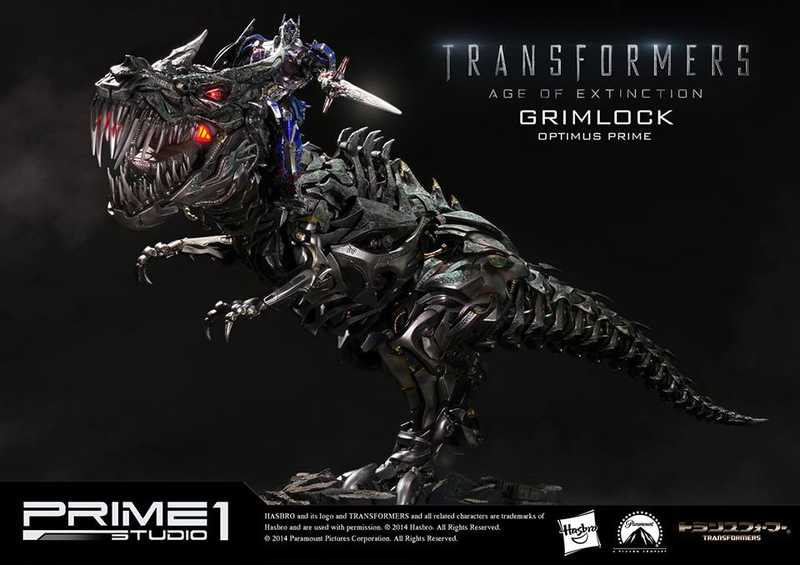 Illustration for article titled Glorious Grimlock and Optimus Prime Statue